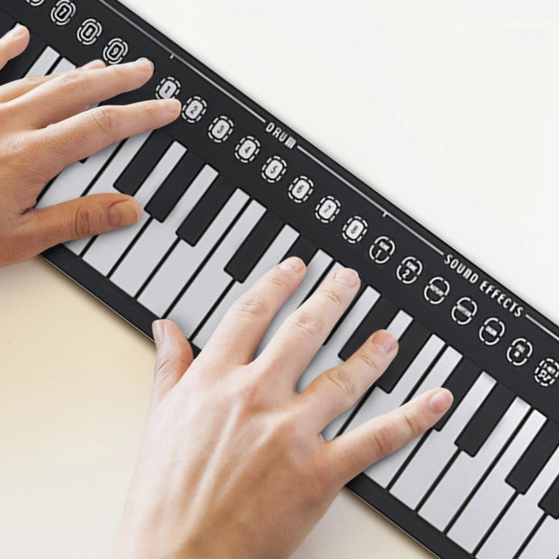 49-Key Portable Roll-Up Electronic Piano Keyboard | Rechargeable Soft Silicone Keys | 16 Tones, 6 Demo Songs | Ideal Beginner Gift (Silvery)